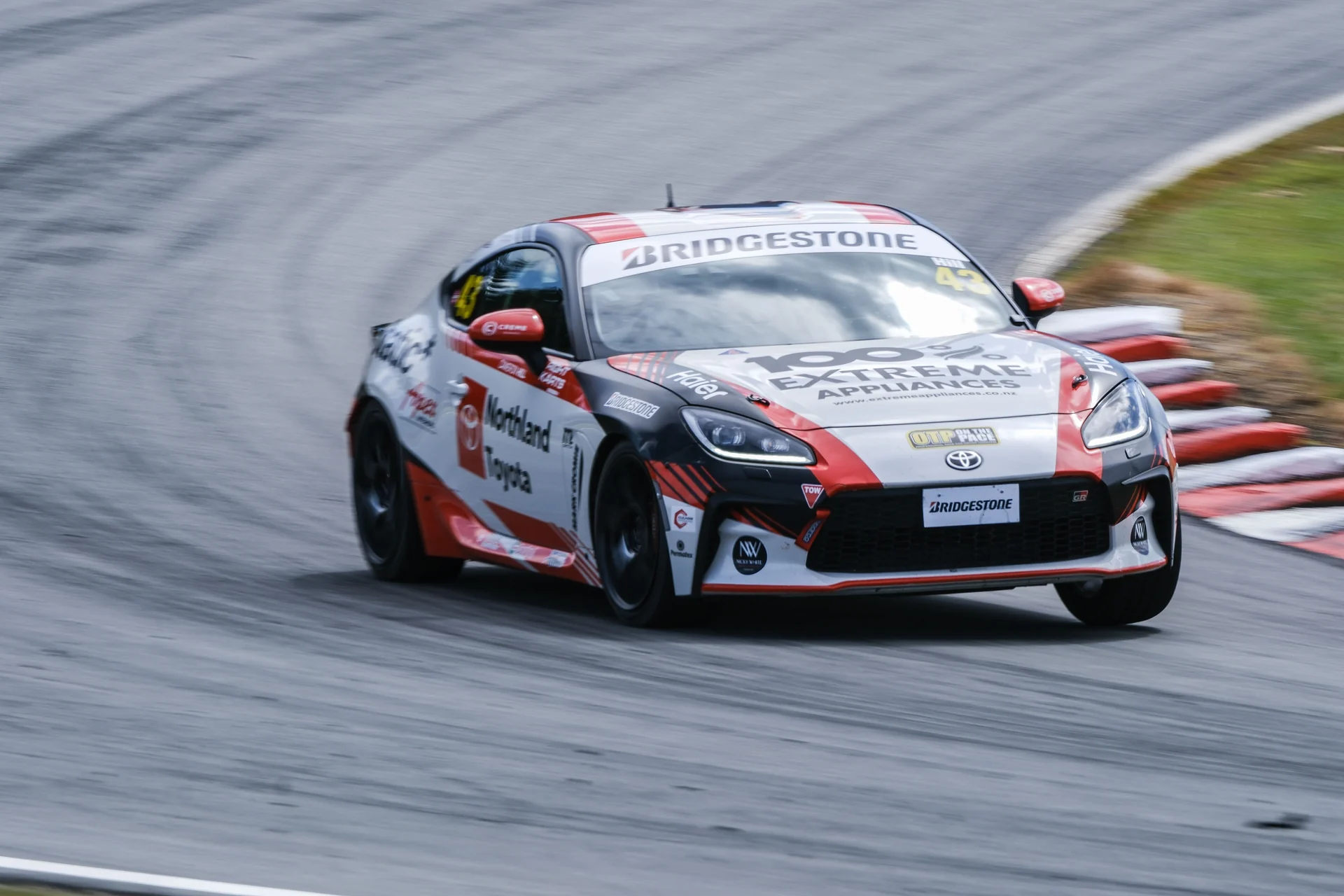 Number 43 GR86 showing partner livery on track