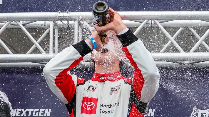 Fourth photo of sliding gallery of Cameron racing.